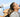 a picture with clear sky one man andone women dirking water from bottle and look satisfy